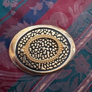 Elegant Gold and Black belt buckle